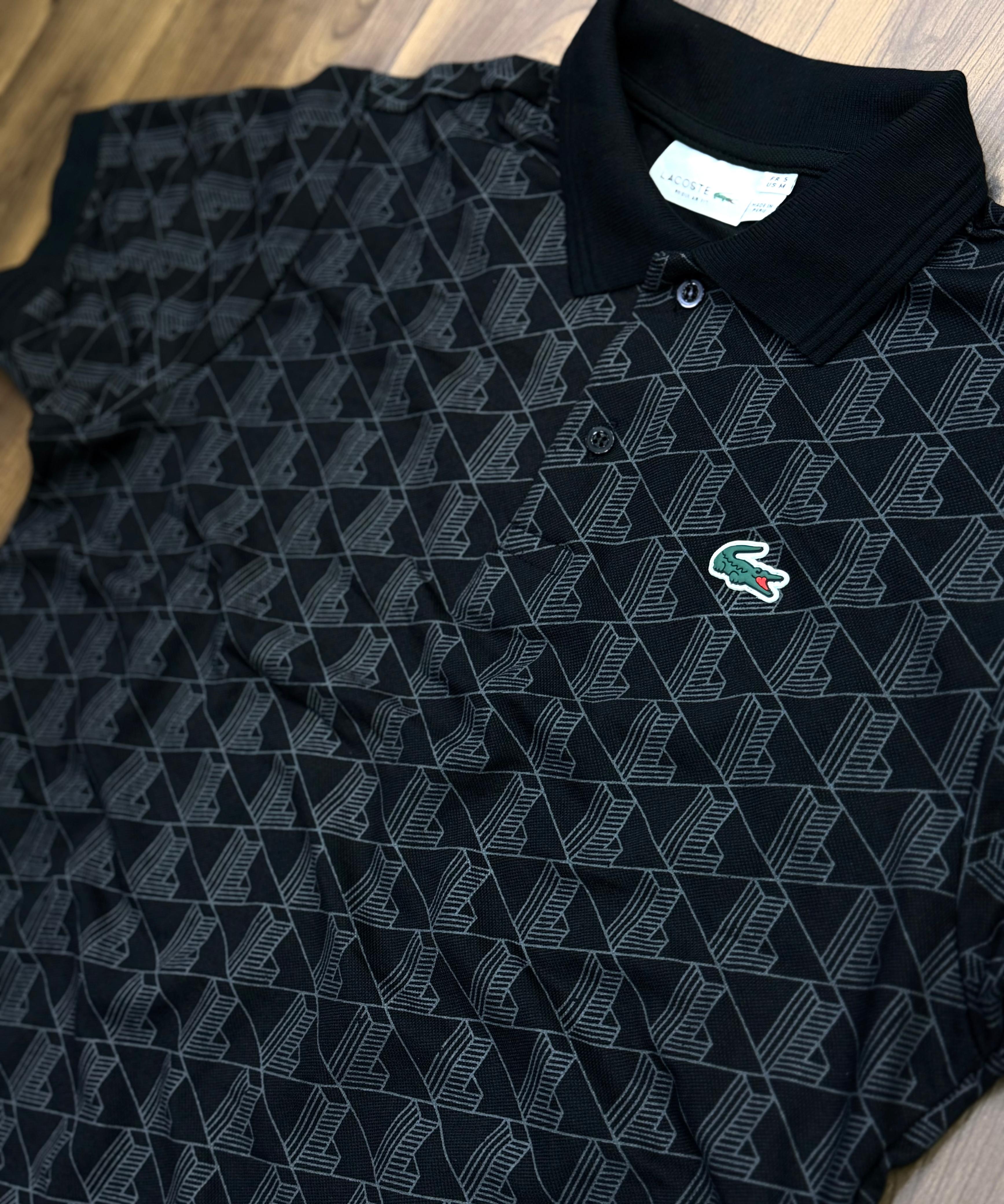 Polo Lacoste manogramica